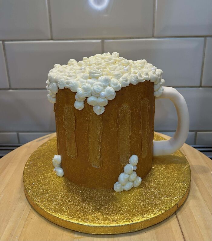 Cake designed to look like a frothy beer mug, showcasing one of the incredible bakes deserving spotlight.