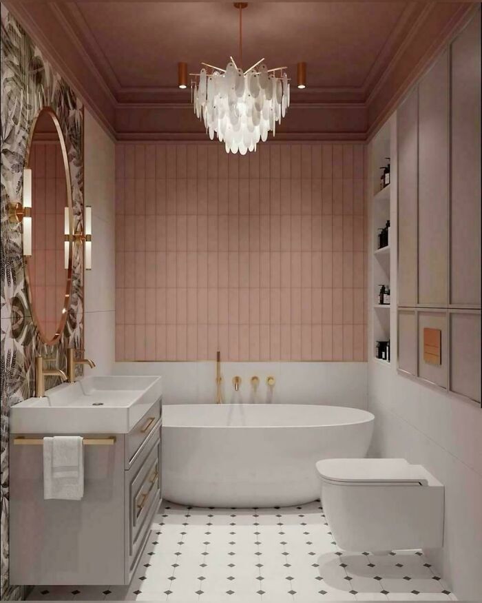 Modern bathroom corner with bathtub, gold fixtures, patterned wallpaper, and elegant lighting showcasing home decorating pride.