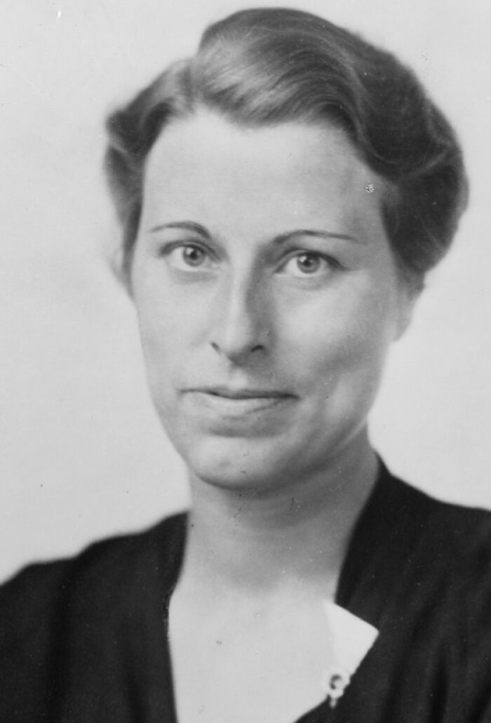 Black and white portrait of a woman scientist with short hair, featured in Smithsonian portraits of remarkable women scientists.