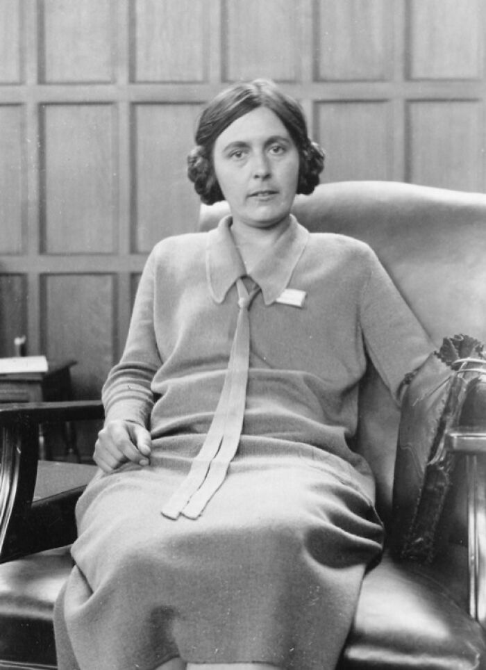 Black and white portrait of a woman scientist seated in an armchair, representing remarkable women scientists in history.