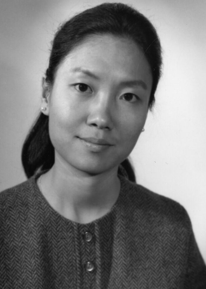 Portrait of a woman scientist with dark hair wearing a buttoned textured top, representing remarkable women scientists.