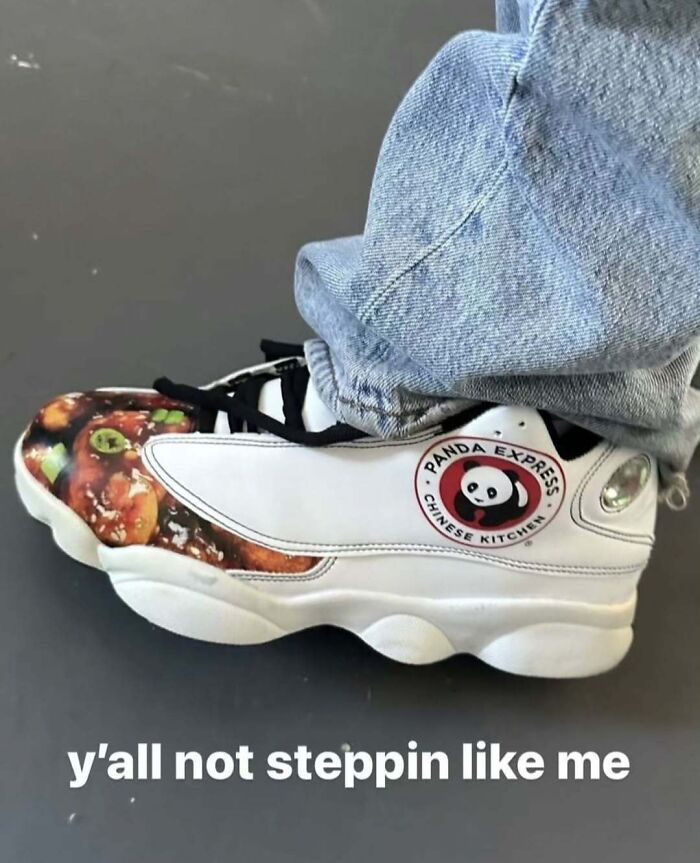White sneaker featuring Panda Express logo and Chinese food design worn with jeans, showcasing memes for broken sense of humor.