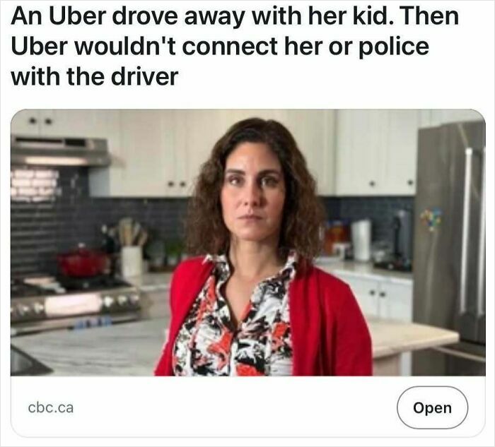 Woman in kitchen with serious expression illustrating shocking headlines that could pass for satire but are true.