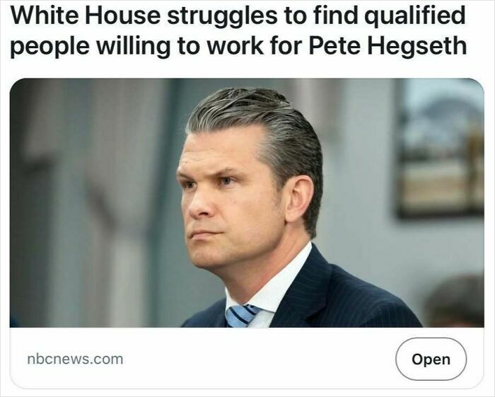 White House struggles headline illustrating satire but true news with serious man in suit and tie indoors.