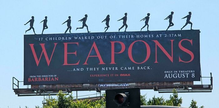 Billboard for the movie Weapons with silhouette of children walking, highlighting details from confusing bad movies in an online group.