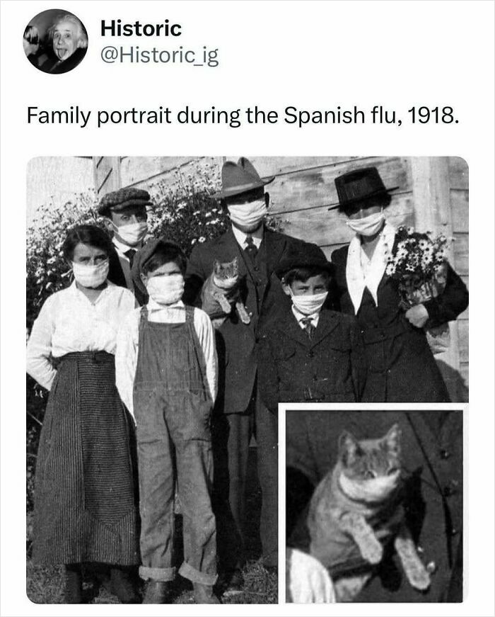Family portrait from 1918 Spanish flu pandemic showing people wearing masks with a cat in the arms, historic photos.