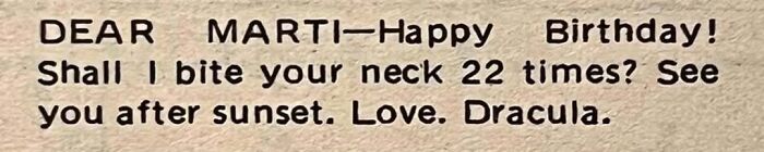 Vintage personals ad text reading a playful birthday message referencing biting a neck, illustrating romance and personal ads.