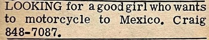 Vintage personals ad typed on aged paper seeking a good girl who wants to motorcycle to Mexico.