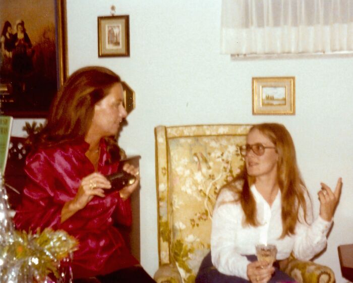 Two women in 1970s Florida setting, engaged in conversation, breaking barriers and challenging norms during the era.
