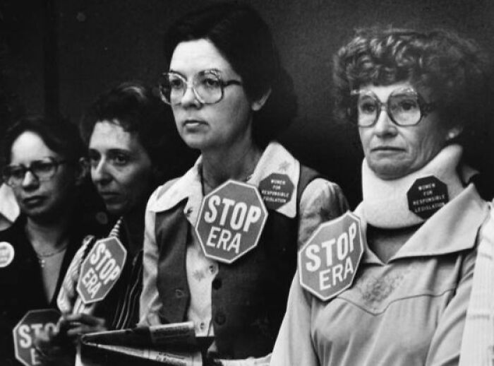 Women in Florida breaking barriers in the 1970s wearing Stop ERA signs at a protest advocating for women’s rights.