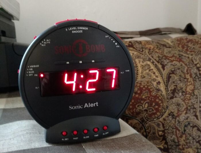 Digital alarm clock showing 4:27 with volume and snooze controls, a genius gadget solving daily time management problems.