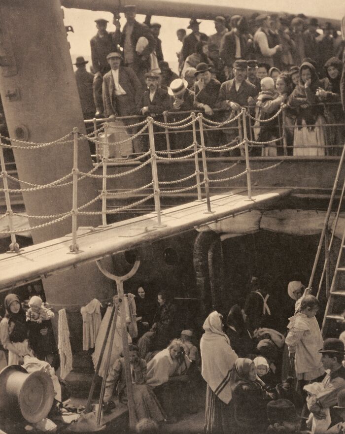Early 20th century immigrants aboard a ship, capturing a significant moment of triumph and tragedy history.