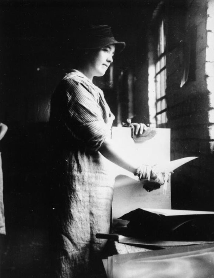 Woman working in a factory during WWI, demonstrating how women changed everything in the wartime workforce.