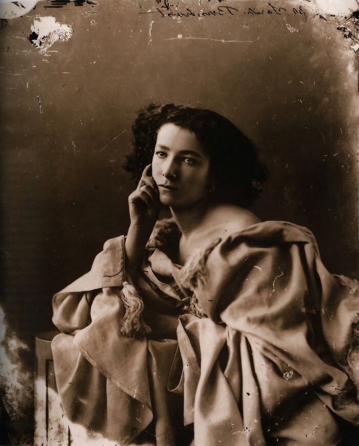19th century invaluable photo of a woman in vintage clothing, capturing history and making the past come alive.