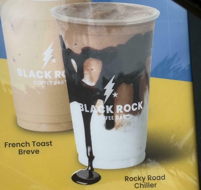 Two Black Rock Coffee Bar drinks, one labeled French Toast Breve, the other Rocky Road Chiller with overflowing chocolate syrup spill.