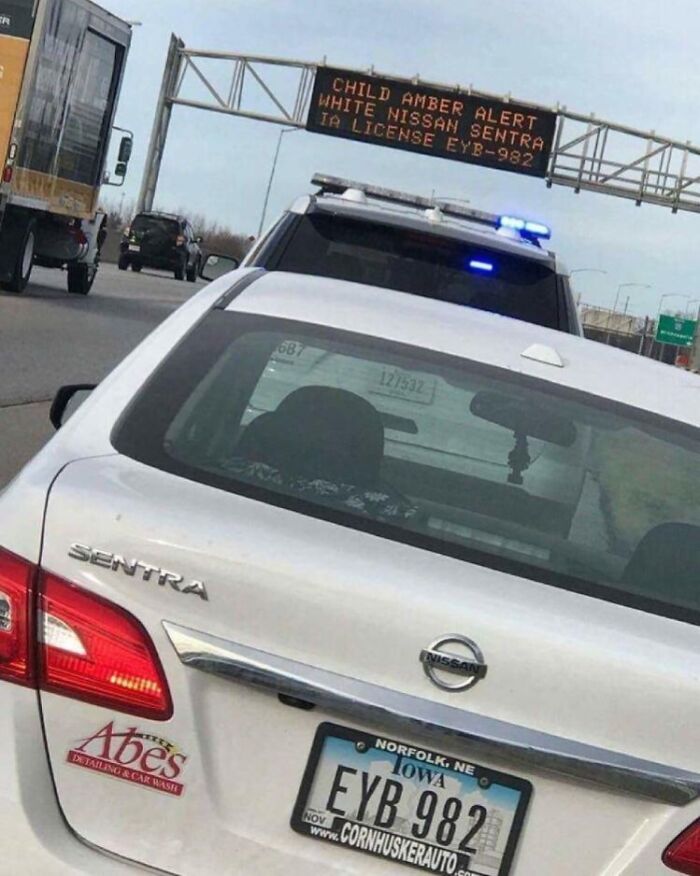 Rare coincidences shown with a Nissan Sentra matching an Amber Alert vehicle license plate on a highway.