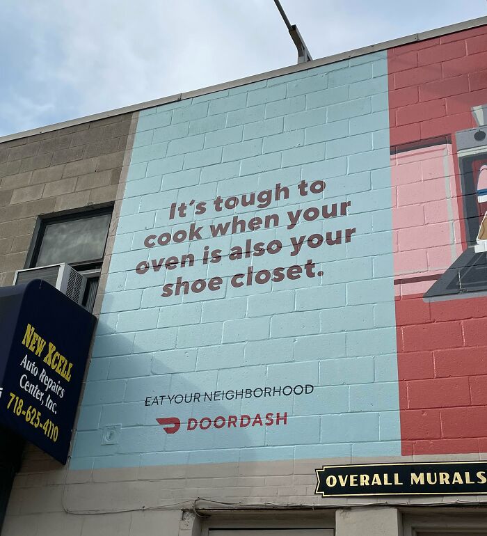 Mural with humorous quote about oven and shoe closet, promoting DoorDash, fitting theme of photos that cross the point of no return.