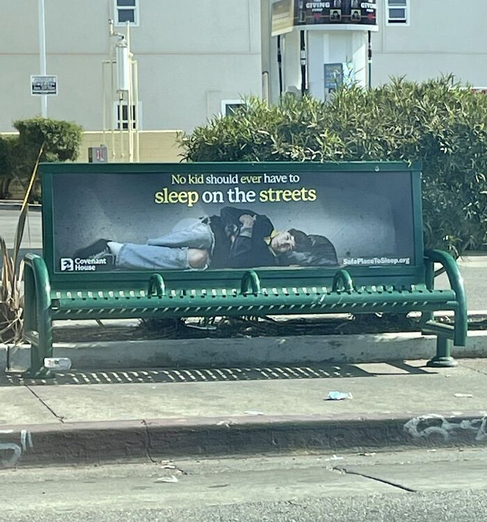 Child sleeping on a street bench with a message about homelessness raising awareness on crossing the point of no return.