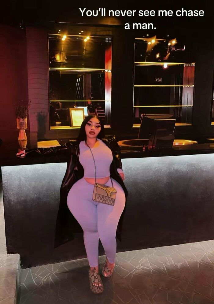 Woman posing indoors with exaggerated body proportions, illustrating distorted Instagram vs reality pics and social media illusions.