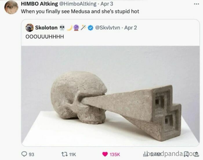 Stone sculpture of a skull with an extended geometric beam from its eye, referencing chaotic mythology memes.