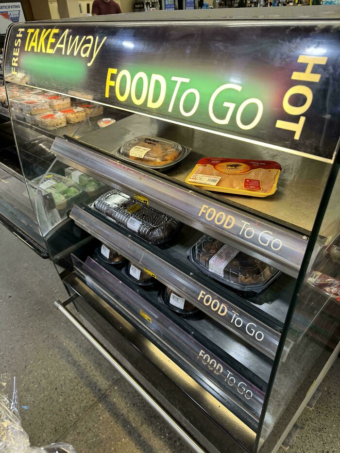 Takeaway food to go display with packaged meals, illustrating careless behavior toward rules and etiquette in public places.