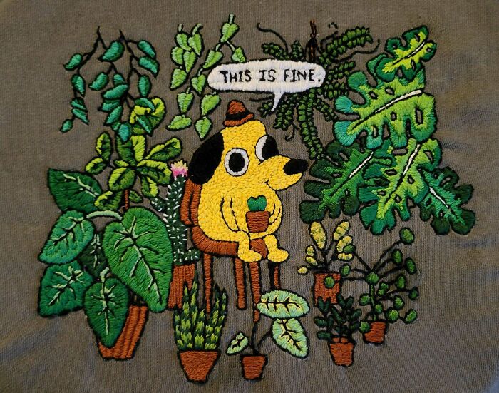 Embroidered artwork of a dog holding a plant, surrounded by various green potted plants showcasing embroidery skills.
