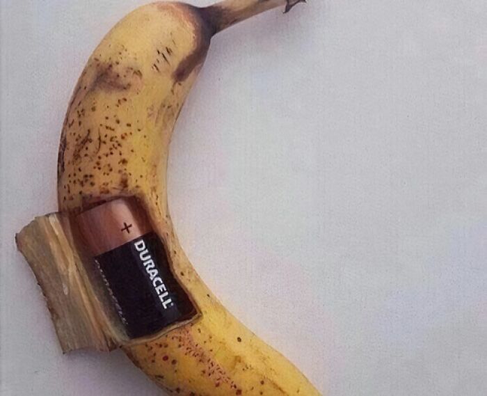 A banana with a Duracell battery embedded, symbolizing harmful food effects on physical and mental health concerns.