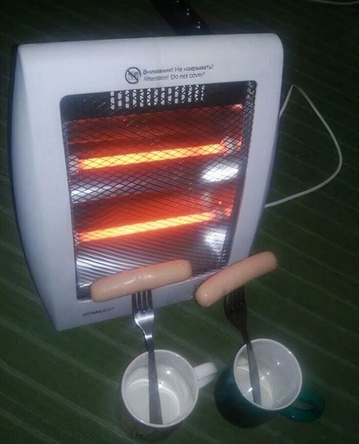 Electric heater used to cook processed sausages, illustrating unhealthy food choices affecting physical and mental health.