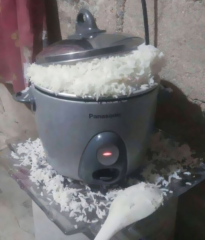 Overflowing rice cooker with spilled rice representing unhealthy food hazards affecting physical and mental health.