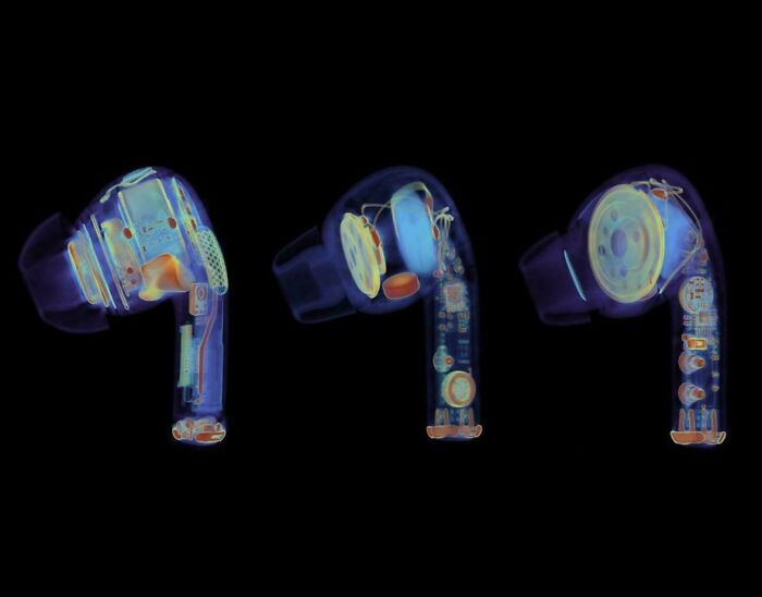 X-ray style close-up comparison of three wireless earbuds showing internal components and design details.