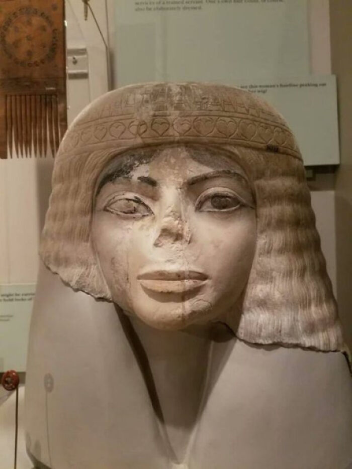 Ancient Egyptian painted limestone bust of a woman with bobbed wig and weathered face, Amazing Photos