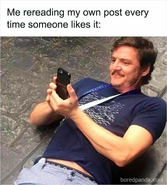 Man lying on the ground smiling and holding phone, illustrating relatable memes about social media habits and feeling called out