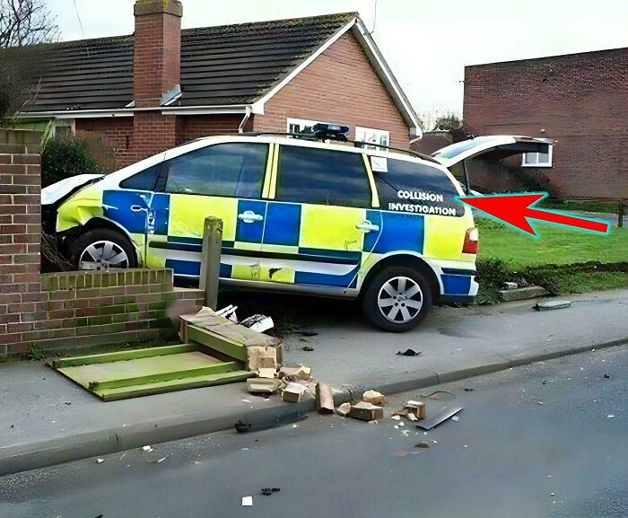 Police collision investigation vehicle crashed into a brick wall, showcasing one of many parking fails shared online.