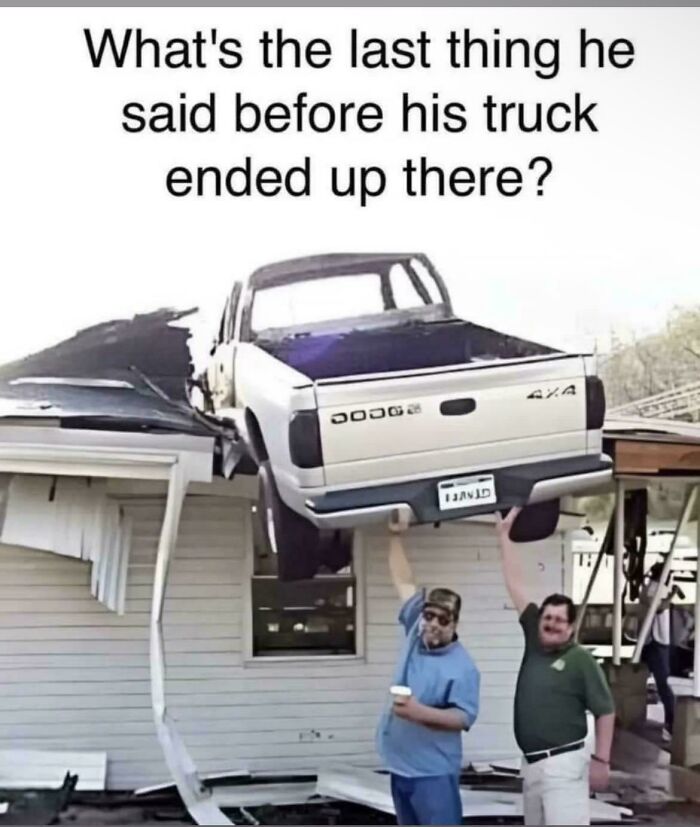 Two men holding up a truck that crashed into a house, showcasing a humorous parking fail moment.