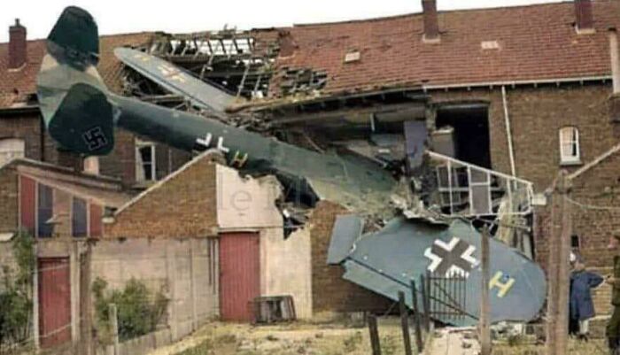 Wartime plane crashed and lodged in residential building, an extreme example of parking fails shared online.