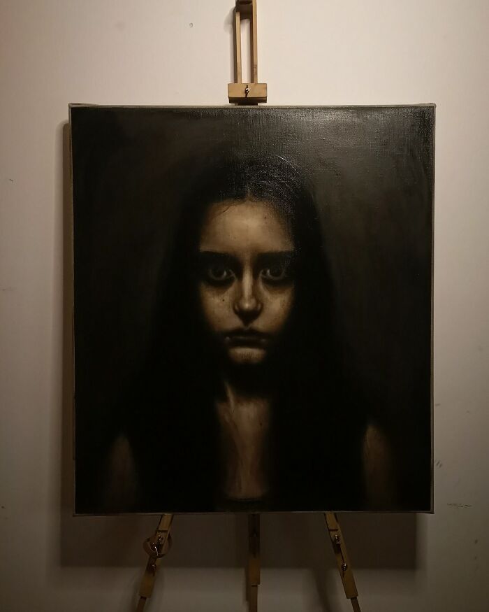 Dark eerie portrait painting of a girl with haunting eyes creating a creepy and unsettling moment captured on canvas.