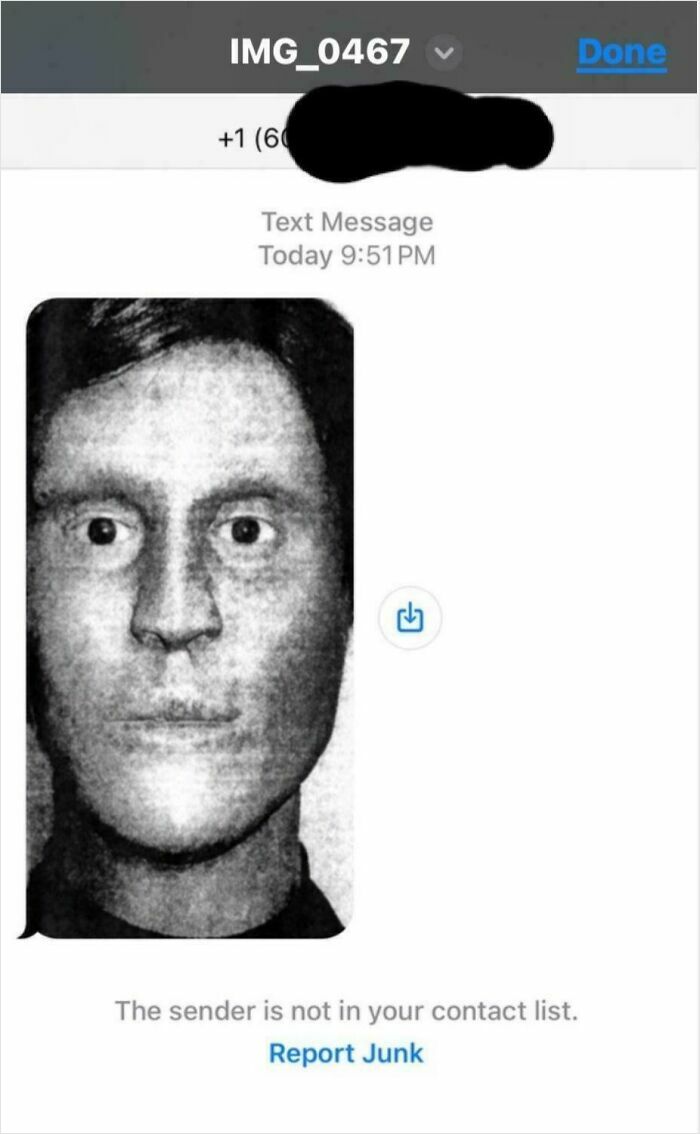 Text message showing a creepy black-and-white face photo sent from an unknown number, capturing an unsettling moment.