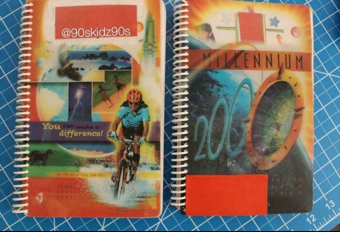 Two 90s-themed spiral notebooks with vibrant covers featuring a cyclist and a millennium design, evoking 90s nostalgia.