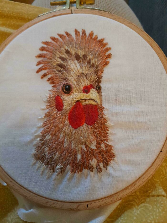 Detailed embroidery creation of a chicken with textured feathers, showcasing inspiration for this hobby.