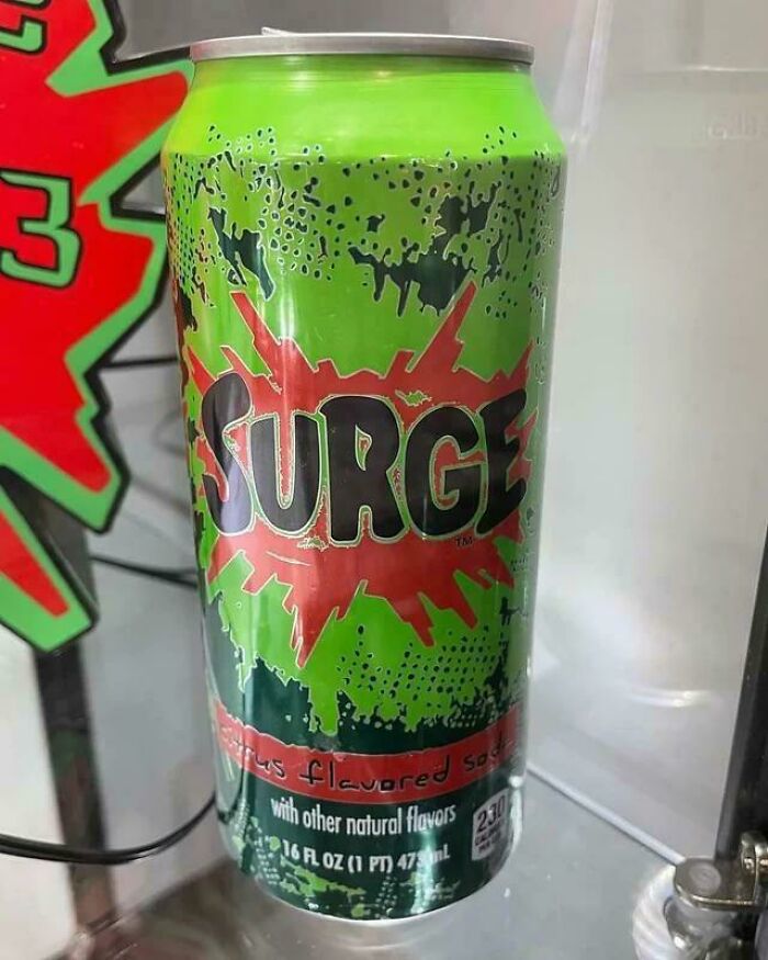 Green Surge soda can with nostalgic 90s design, showcasing citrus-flavored soda to unlock memories from the 90s era.