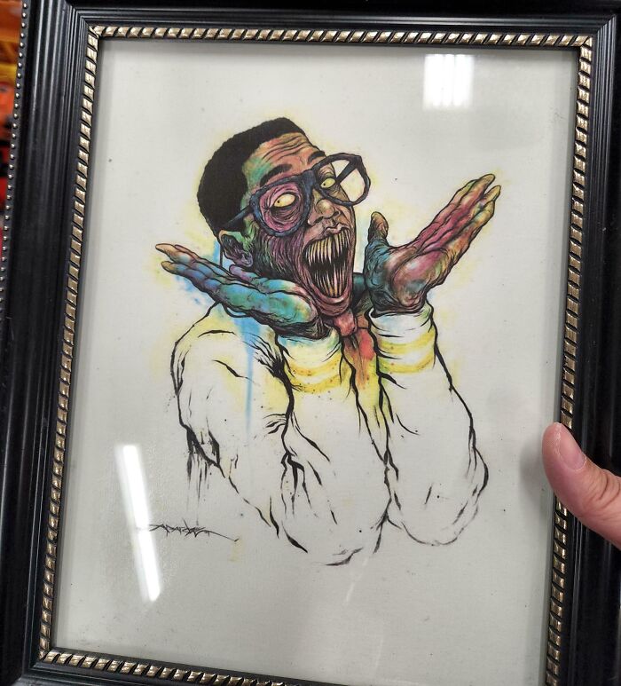 Framed eerie artwork of a distorted figure with wide mouth and glasses, capturing creepy and unsettling moments.