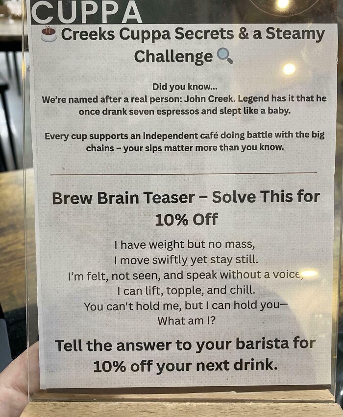 Menu sign with a brew brain teaser offering 10% off, highlighting creativity at a bar and restaurant around the world.