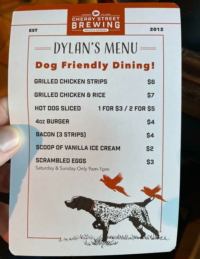 Menu from a creative bar and restaurant featuring dog friendly dining options and unique food choices.