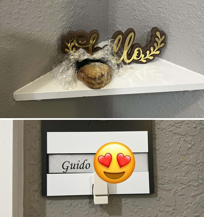 Rock painted with a heart and wrapped in plastic on shelf with hello sign, showing wholesome kind neighbors' gesture.