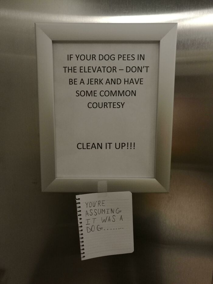 Framed note and a handwritten reply in an elevator illustrating hilariously random signs that remind us not to take life too seriously.