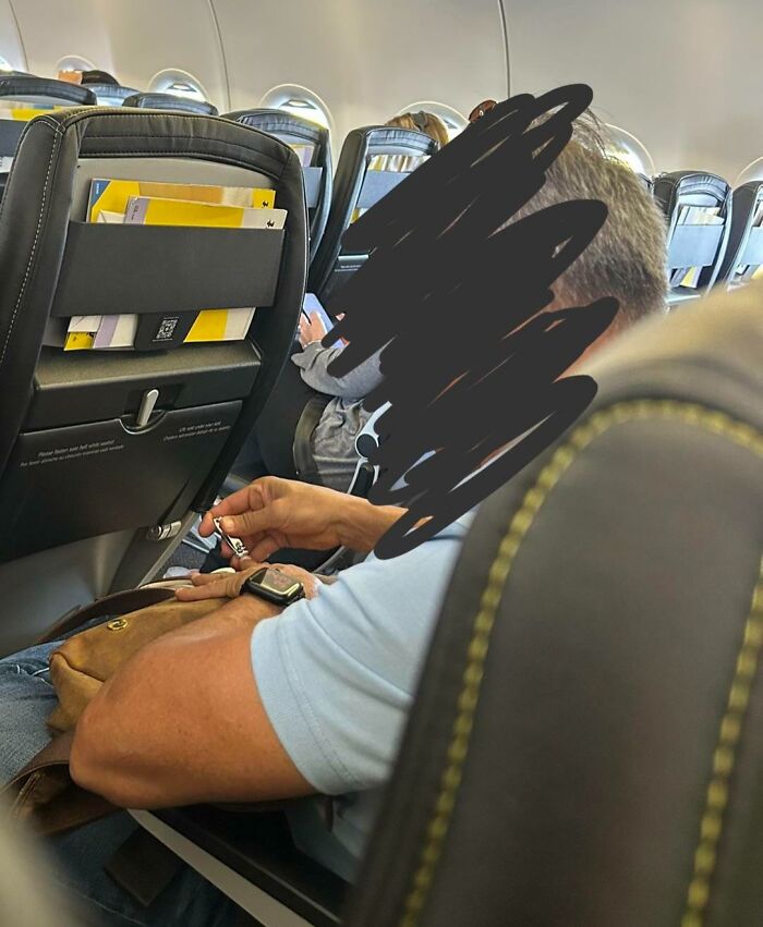 Man on airplane reclines seat into personal space showing selfish behavior making life harder for everyone else on board.