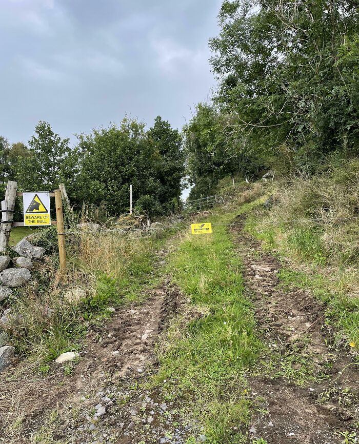 Rural path blocked with selfish people ignoring signs, making life harder for everyone else in the area.