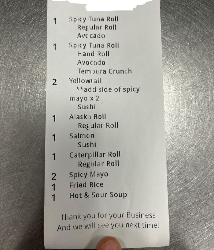 Receipt for sushi order including spicy tuna roll, yellowtail with spicy mayo, and other items showing selfish people impact on service.