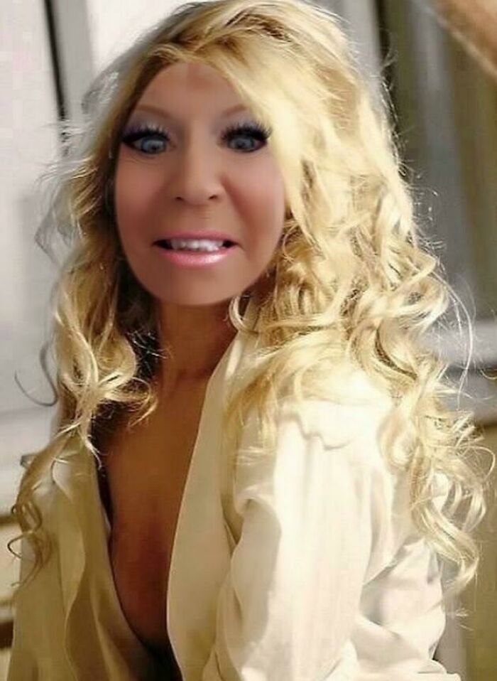 Woman with exaggerated features and overly edited face illustrating Photoshop fails with distorted facial proportions.