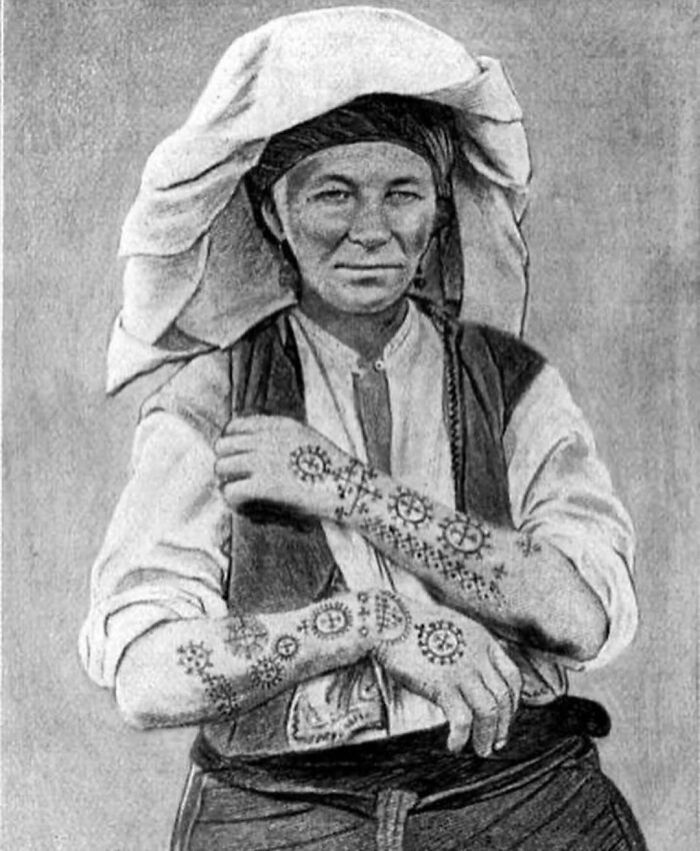 Black and white historical drawing of a person with intricate tattoos on arms, illustrating weird history pics that change the past view.